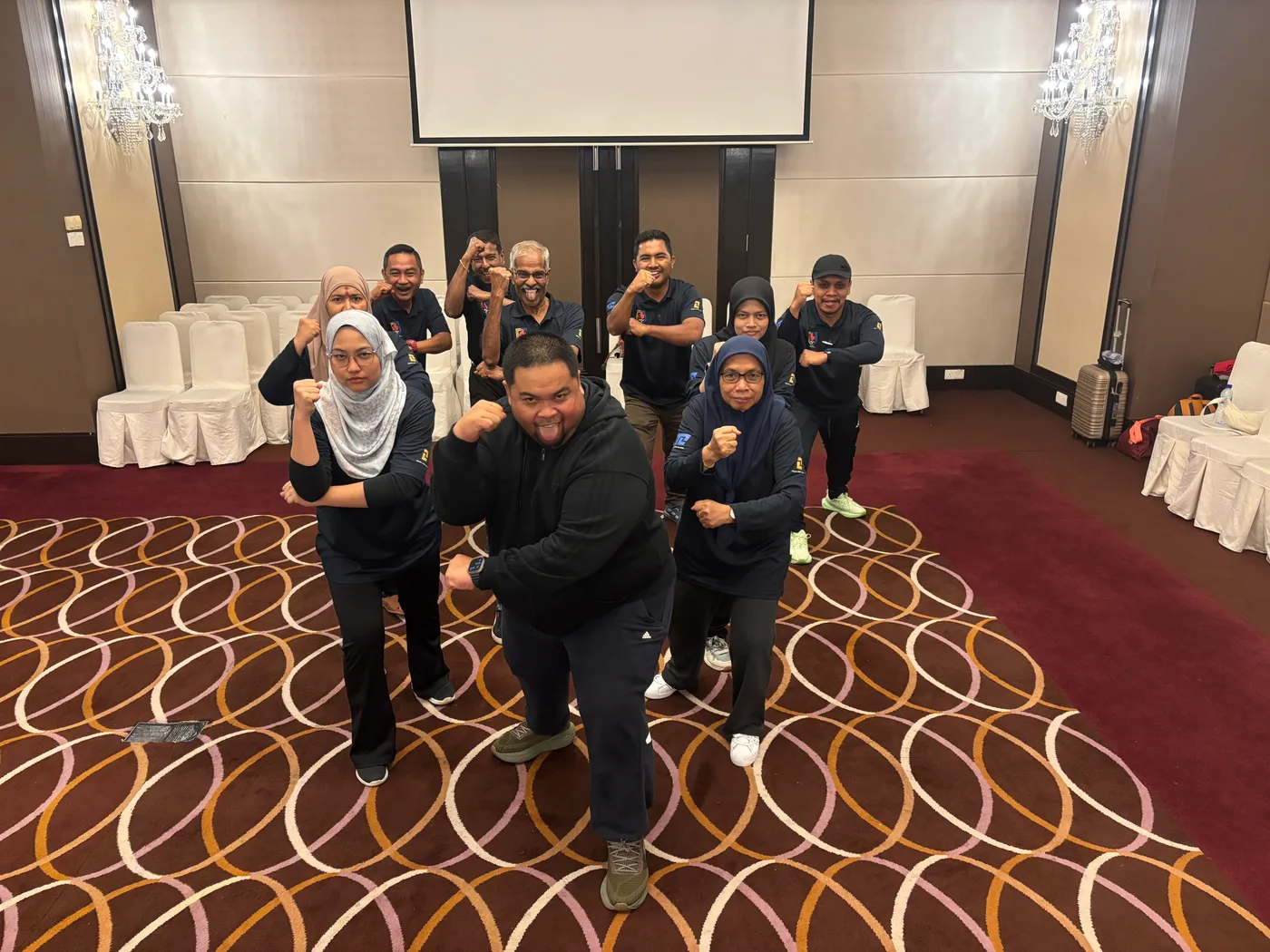 Tetra Exponus team in a playful pose during a programme