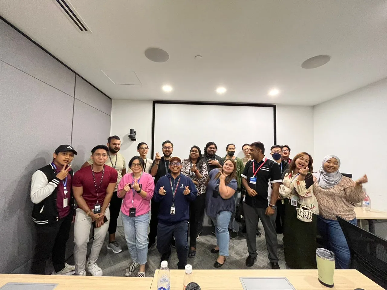 Tetra Exponus training cohort group photo in a meeting room